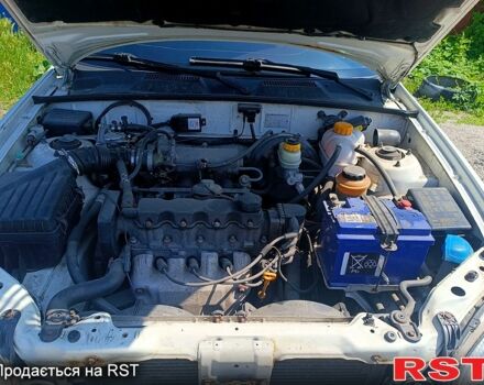 Білий Деу Ланос, об'ємом двигуна 1.5 л та пробігом 127 тис. км за 2350 $, фото 1 на Automoto.ua