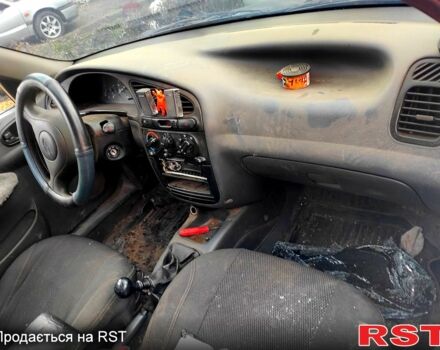 Белый Дэу Ланос, объемом двигателя 1.5 л и пробегом 300 тыс. км за 800 $, фото 5 на Automoto.ua