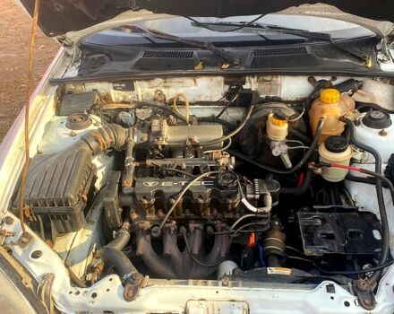 Белый Дэу Ланос, объемом двигателя 1.5 л и пробегом 200 тыс. км за 1000 $, фото 8 на Automoto.ua