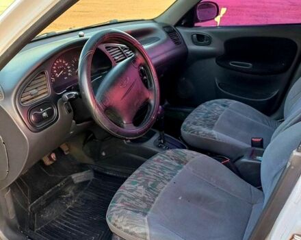 Білий Деу Ланос, об'ємом двигуна 1.5 л та пробігом 0 тис. км за 2300 $, фото 5 на Automoto.ua