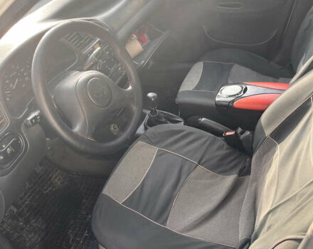 Білий Деу Ланос, об'ємом двигуна 1.5 л та пробігом 426 тис. км за 2700 $, фото 11 на Automoto.ua