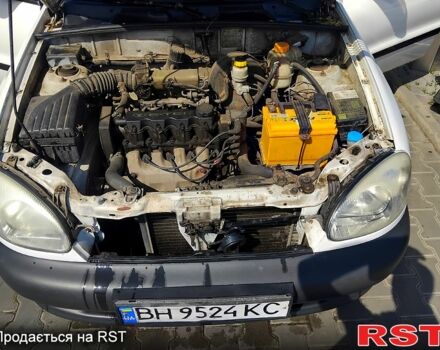 Белый Дэу Ланос, объемом двигателя 1.5 л и пробегом 301 тыс. км за 1750 $, фото 3 на Automoto.ua