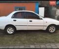 Белый Дэу Ланос, объемом двигателя 1.5 л и пробегом 270 тыс. км за 1500 $, фото 1 на Automoto.ua