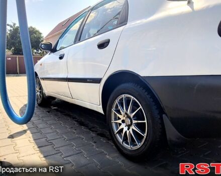 Белый Дэу Ланос, объемом двигателя 1.5 л и пробегом 301 тыс. км за 1750 $, фото 2 на Automoto.ua