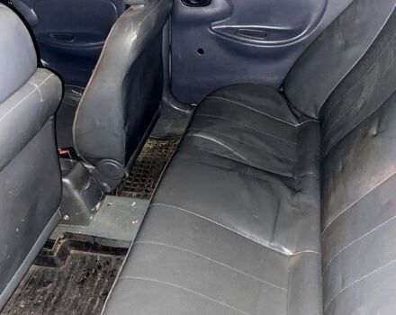 Белый Дэу Ланос, объемом двигателя 1.5 л и пробегом 200 тыс. км за 1000 $, фото 9 на Automoto.ua