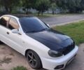 Белый Дэу Ланос, объемом двигателя 2 л и пробегом 253 тыс. км за 2200 $, фото 1 на Automoto.ua