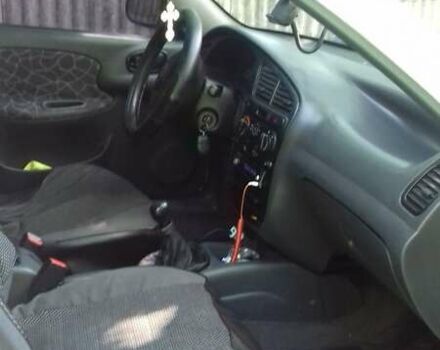 Белый Дэу Ланос, объемом двигателя 1.3 л и пробегом 450 тыс. км за 2000 $, фото 2 на Automoto.ua