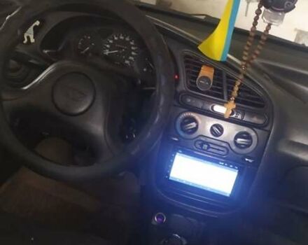 Білий Деу Ланос, об'ємом двигуна 1.35 л та пробігом 290 тис. км за 1100 $, фото 4 на Automoto.ua