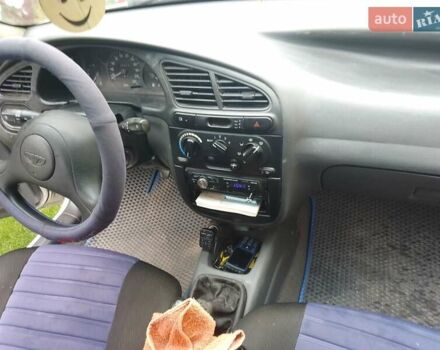 Белый Дэу Ланос, объемом двигателя 1.3 л и пробегом 300 тыс. км за 1300 $, фото 6 на Automoto.ua