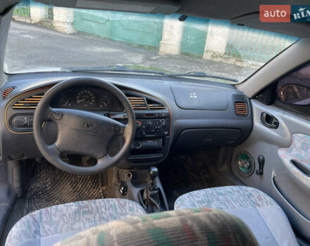 Белый Дэу Ланос, объемом двигателя 1.3 л и пробегом 270 тыс. км за 1300 $, фото 5 на Automoto.ua