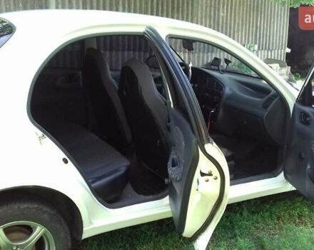 Белый Дэу Ланос, объемом двигателя 1.3 л и пробегом 450 тыс. км за 2000 $, фото 6 на Automoto.ua