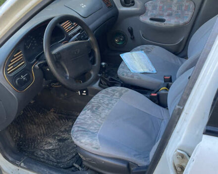 Белый Дэу Ланос, объемом двигателя 1.3 л и пробегом 270 тыс. км за 1300 $, фото 7 на Automoto.ua