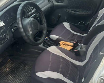 Білий Деу Ланос, об'ємом двигуна 1.5 л та пробігом 556 тис. км за 1800 $, фото 9 на Automoto.ua