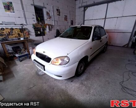Белый Дэу Ланос, объемом двигателя 1.5 л и пробегом 300 тыс. км за 1250 $, фото 2 на Automoto.ua