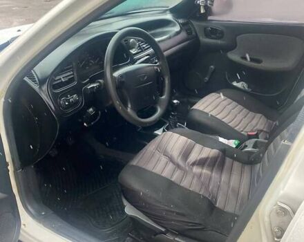 Белый Дэу Ланос, объемом двигателя 1.5 л и пробегом 255 тыс. км за 1500 $, фото 4 на Automoto.ua