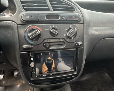 Білий Деу Ланос, об'ємом двигуна 1.5 л та пробігом 556 тис. км за 1800 $, фото 8 на Automoto.ua