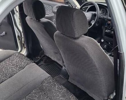 Дэу Ланос 2003 в Днепре (Днепропетровске) на Automoto.ua Белый Дэу Ланос, объемом двигателя 1.5 л и пробегом 338 тыс. км за 2200 $, фото 7 на Automoto.ua