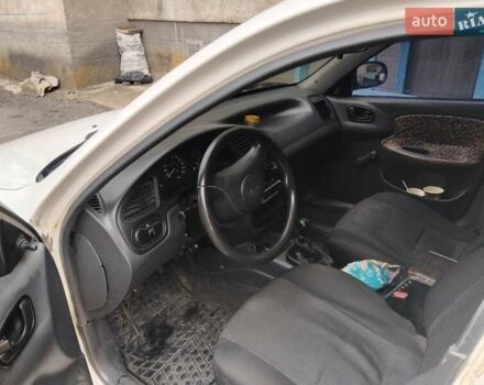Белый Дэу Ланос, объемом двигателя 1.5 л и пробегом 397 тыс. км за 1900 $, фото 1 на Automoto.ua