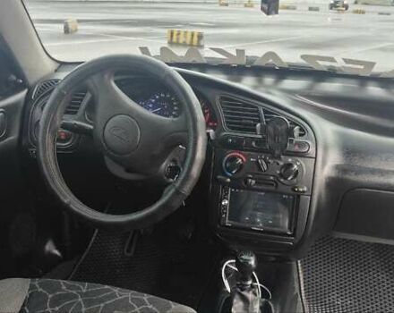 Білий Деу Ланос, об'ємом двигуна 1.5 л та пробігом 186 тис. км за 2600 $, фото 7 на Automoto.ua