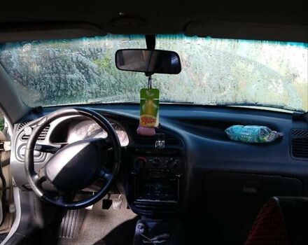 Білий Деу Ланос, об'ємом двигуна 1.5 л та пробігом 420 тис. км за 2350 $, фото 4 на Automoto.ua