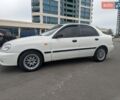 Белый Дэу Ланос, объемом двигателя 1.5 л и пробегом 200 тыс. км за 2200 $, фото 4 на Automoto.ua