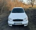 Белый Дэу Ланос, объемом двигателя 1.6 л и пробегом 200 тыс. км за 1599 $, фото 2 на Automoto.ua