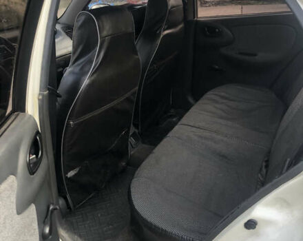 Белый Дэу Ланос, объемом двигателя 1.5 л и пробегом 268 тыс. км за 1300 $, фото 5 на Automoto.ua