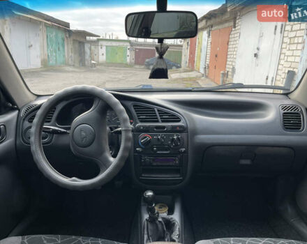 Белый Дэу Ланос, объемом двигателя 1.5 л и пробегом 207 тыс. км за 2950 $, фото 11 на Automoto.ua