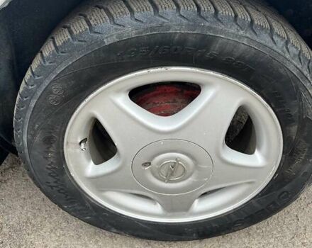 Білий Деу Ланос, об'ємом двигуна 1.5 л та пробігом 215 тис. км за 1400 $, фото 8 на Automoto.ua