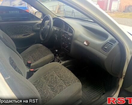 Белый Дэу Ланос, объемом двигателя 1.5 л и пробегом 200 тыс. км за 1350 $, фото 6 на Automoto.ua