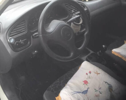 Белый Дэу Ланос, объемом двигателя 1.5 л и пробегом 353 тыс. км за 2200 $, фото 6 на Automoto.ua