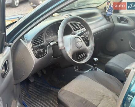 Белый Дэу Ланос, объемом двигателя 1.5 л и пробегом 320 тыс. км за 1700 $, фото 3 на Automoto.ua