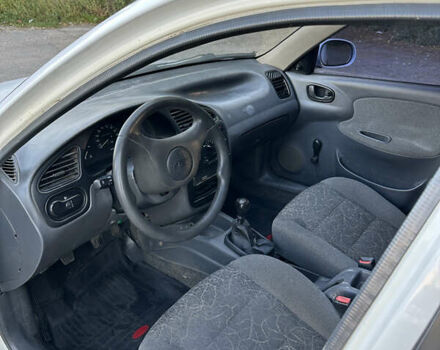 Белый Дэу Ланос, объемом двигателя 1.5 л и пробегом 301 тыс. км за 2300 $, фото 10 на Automoto.ua