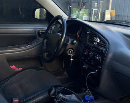 Белый Дэу Ланос, объемом двигателя 1.5 л и пробегом 110 тыс. км за 2700 $, фото 7 на Automoto.ua