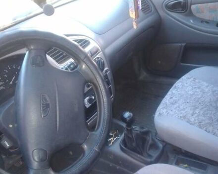 Белый Дэу Ланос, объемом двигателя 1.6 л и пробегом 220 тыс. км за 2200 $, фото 17 на Automoto.ua