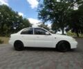 Белый Дэу Ланос, объемом двигателя 1.5 л и пробегом 200 тыс. км за 2200 $, фото 1 на Automoto.ua
