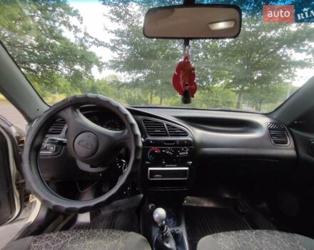 Деу Ланос 2005 у Кропивницькому (Кіровограді) на Automoto.ua Білий Деу Ланос, об'ємом двигуна 1.5 л та пробігом 120 тис. км за 1600 $, фото 10 на Automoto.ua