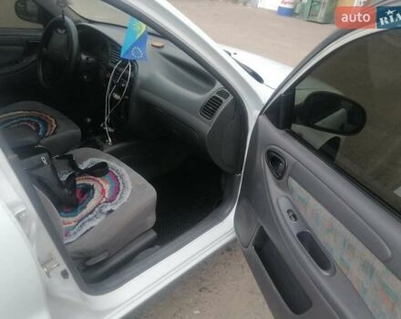 Белый Дэу Ланос, объемом двигателя 1.5 л и пробегом 380 тыс. км за 3000 $, фото 4 на Automoto.ua