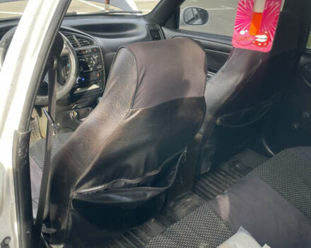 Білий Деу Ланос, об'ємом двигуна 1.5 л та пробігом 218 тис. км за 1533 $, фото 8 на Automoto.ua