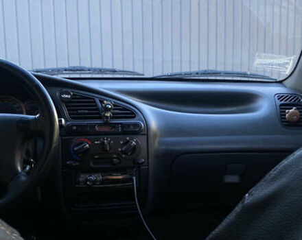 Белый Дэу Ланос, объемом двигателя 1.5 л и пробегом 110 тыс. км за 2700 $, фото 6 на Automoto.ua