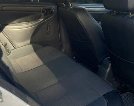 Белый Дэу Ланос, объемом двигателя 1.5 л и пробегом 110 тыс. км за 2700 $, фото 4 на Automoto.ua