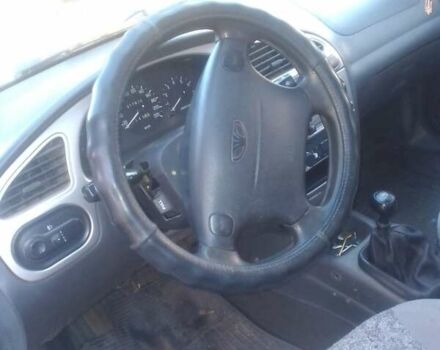 Белый Дэу Ланос, объемом двигателя 1.6 л и пробегом 220 тыс. км за 2200 $, фото 19 на Automoto.ua