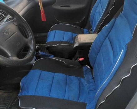 Белый Дэу Ланос, объемом двигателя 1.6 л и пробегом 362 тыс. км за 2300 $, фото 1 на Automoto.ua