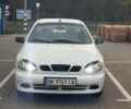 Белый Дэу Ланос, объемом двигателя 1.5 л и пробегом 227 тыс. км за 2100 $, фото 1 на Automoto.ua