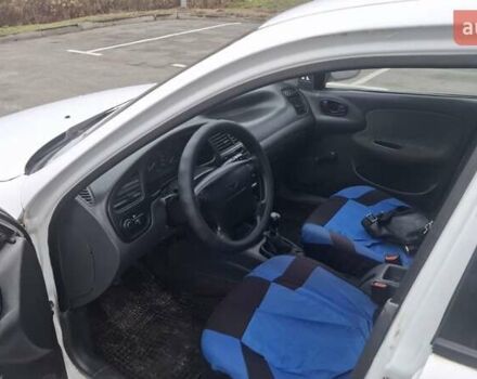 Белый Дэу Ланос, объемом двигателя 1.5 л и пробегом 270 тыс. км за 1275 $, фото 7 на Automoto.ua