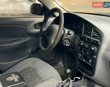 Белый Дэу Ланос, объемом двигателя 1.5 л и пробегом 310 тыс. км за 1250 $, фото 11 на Automoto.ua