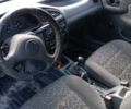 Белый Дэу Ланос, объемом двигателя 1.5 л и пробегом 215 тыс. км за 1400 $, фото 4 на Automoto.ua