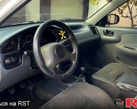 Дэу Ланос 2006 в Врадиевке на Automoto.ua Белый Дэу Ланос, объемом двигателя 1.5 л и пробегом 185 тыс. км за 2200 $, фото 10 на Automoto.ua