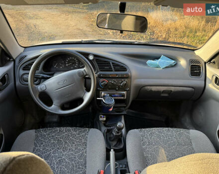 Белый Дэу Ланос, объемом двигателя 1.6 л и пробегом 152 тыс. км за 2000 $, фото 7 на Automoto.ua