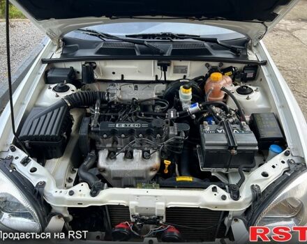 Белый Дэу Ланос, объемом двигателя 1.5 л и пробегом 204 тыс. км за 2450 $, фото 7 на Automoto.ua